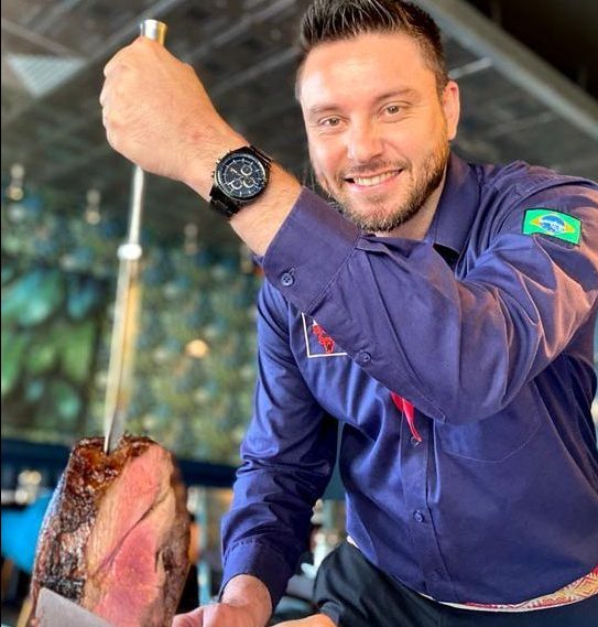 Chef serving at RIO Brazilian Steakhouse