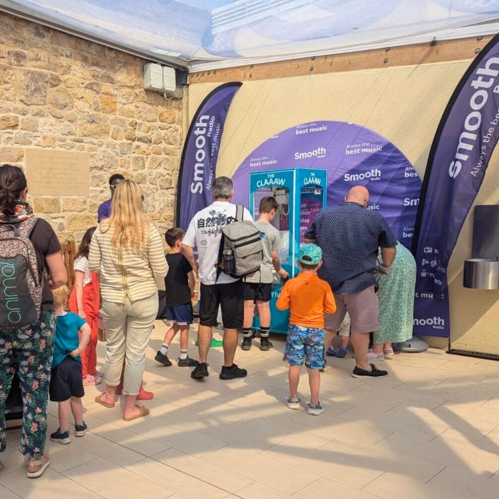 families queuing to try the Arriva Claw
