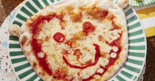 ask italian happy face pizza