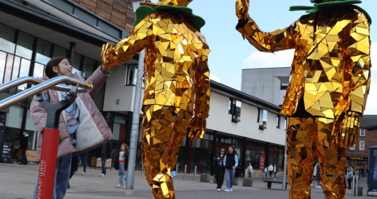 Gold Men on St Patrick's Day high five